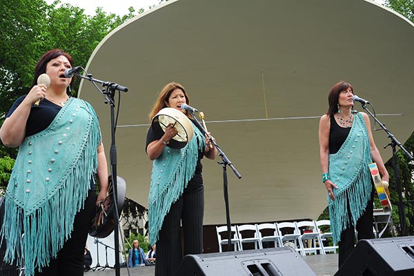 Indigenous Canadian trio Asani opens the garden party with a performance of O Canada.